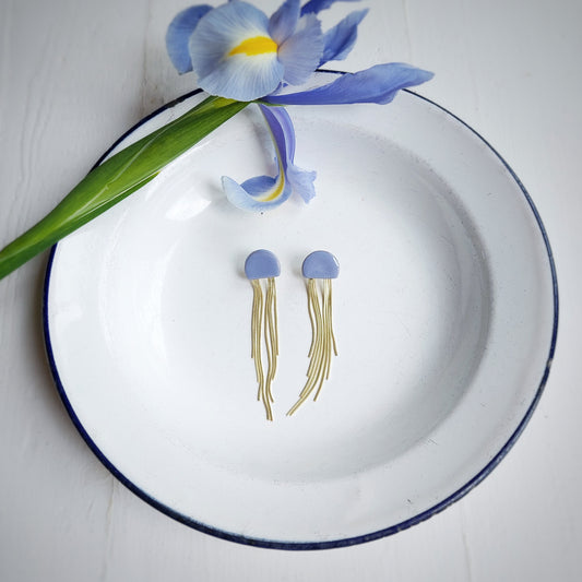 Orecchini lunghi in ceramica azzurra con base color oro