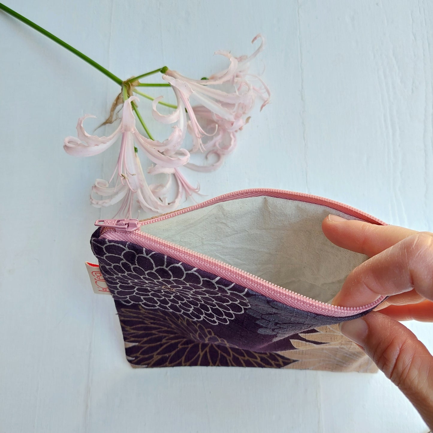 Pochette in fantasia di cotone marrone e rosa foderata