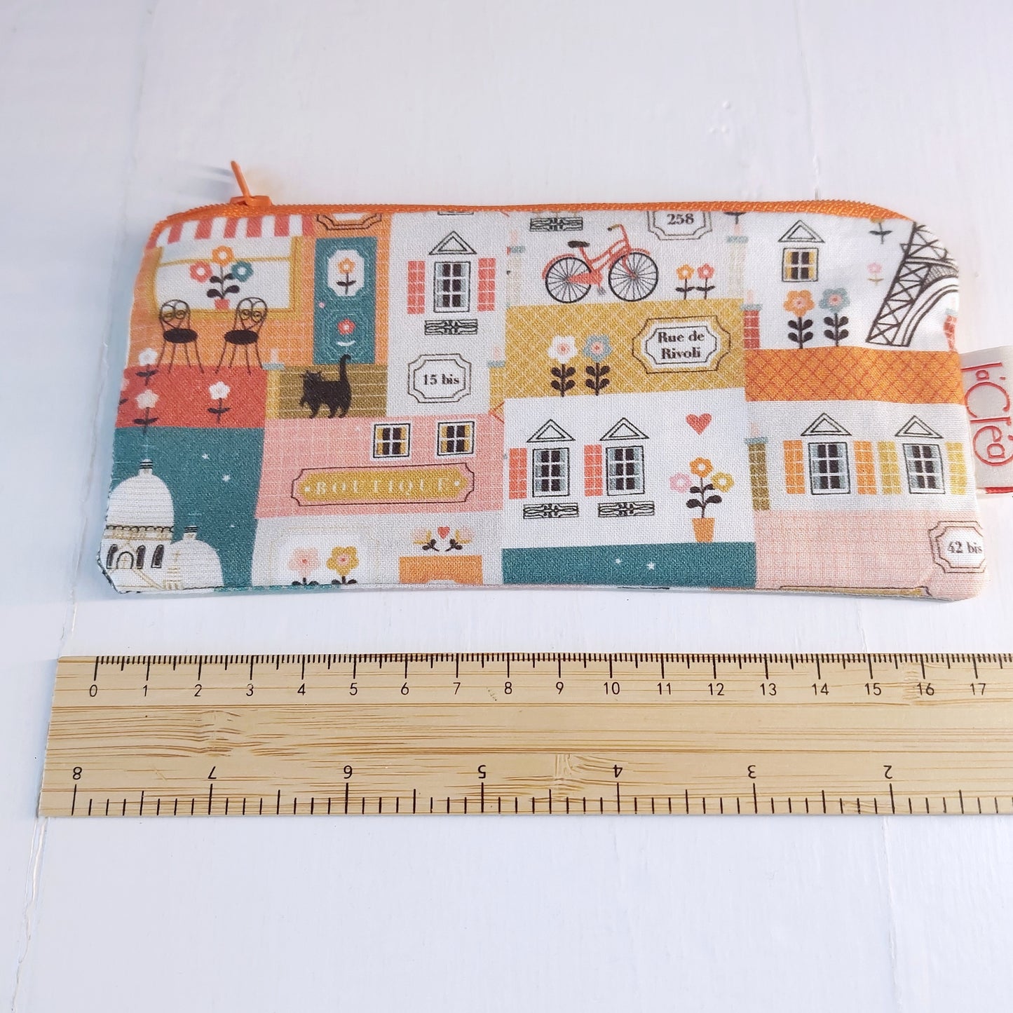 Pochette in cotone con tessuto Casette, foderata.